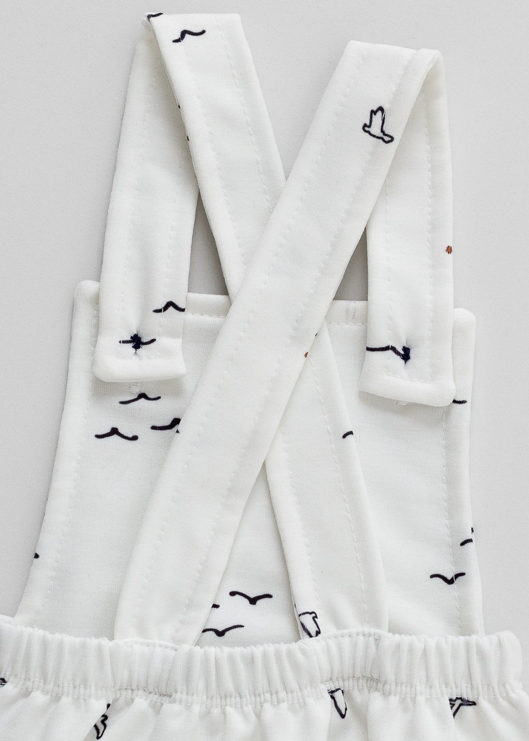 02 romper jardineira bebe gaivotas