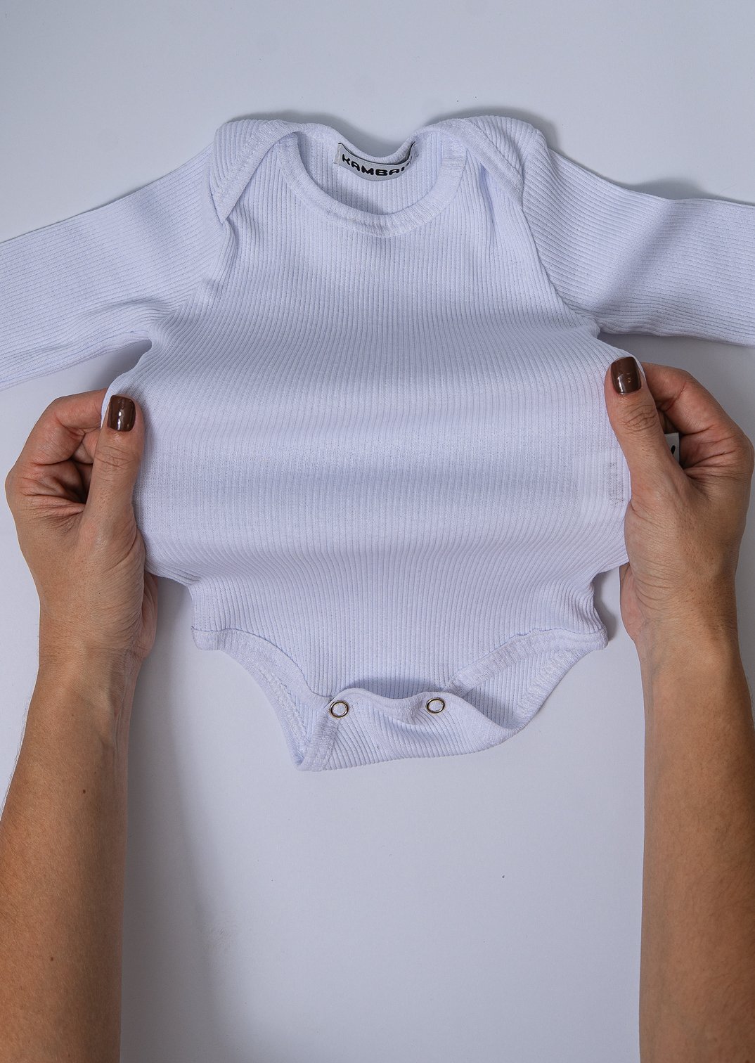 Body beb&ecirc; manga longa canelado Kambai em algod&atilde;o 100%, com gola envelope